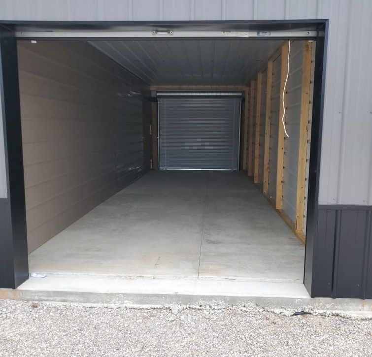 The inside of a 10 ft by 30 ft unit viewed from the open door.